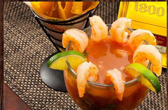 Shrimp cocktail with lime and tortilla chips